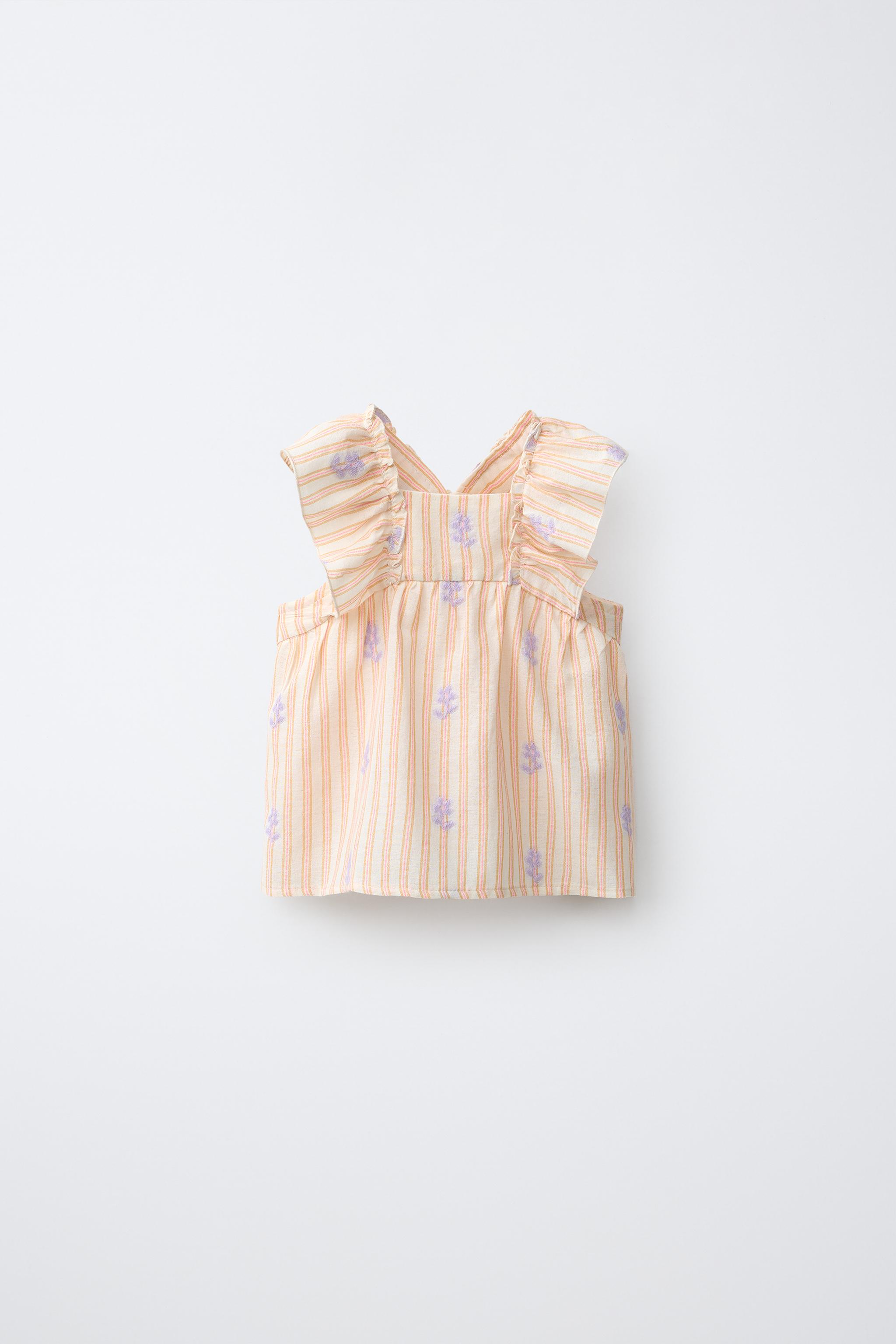 BLOUSE À RAYURES ET FLEURS